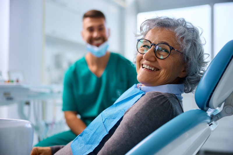 Senior woman at the clinic for dental implant infection treatment in South Ogden & Kaysville, UT