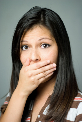 women covering mouth